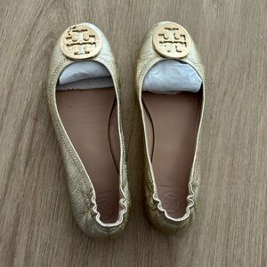 Tory Burch. I believe size 8. Maybe 7.5